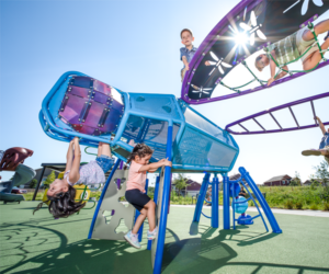 Image of children climbing on playground equipment
