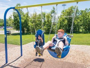 Inclusive playground swing