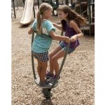 Young Girls Playing On Barrel Ride